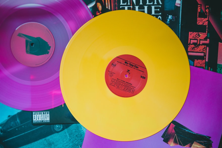 yellow round plastic vynyl record